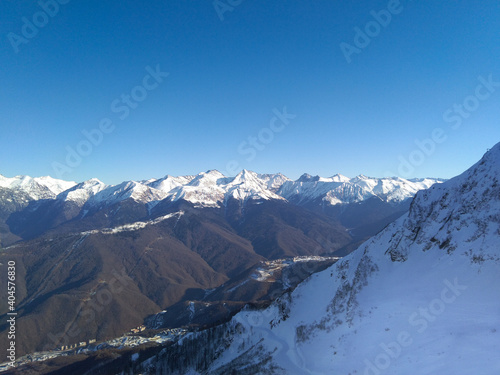 Snowy mountains on a bright blue day. Krasnaya polyana, Krasnodarsky krai, Russia 