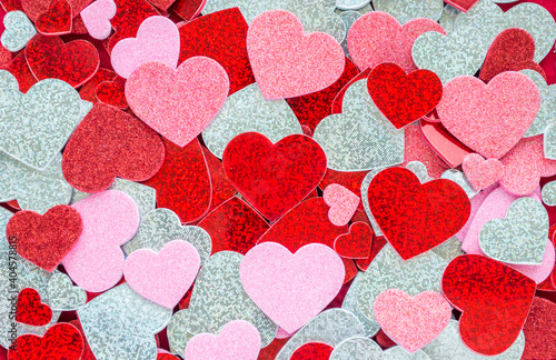 background texture-jumble of tiny festive sparkly hearts for Valentine's Day