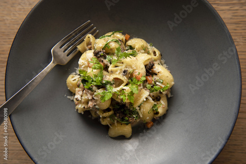 Lumache pasta with short rib and black truffle  photo