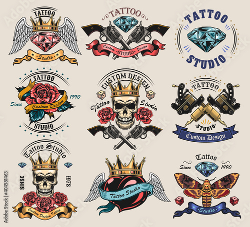 Vintage tattoo studio emblems set. Retro logos with cross guns, skulls in crown, skeleton, rose isolated vector illustration collection. Tattoo studio and design elements concept