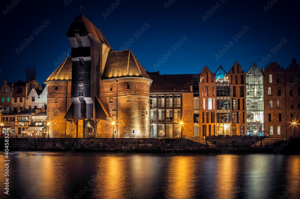 Naklejka premium Historic old town and historic port crane in Gdansk in the evening time, Poland