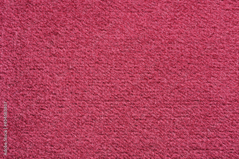 Close-up of a red velvety upholstery fabric Close-up of a red velvety upholstery fabric