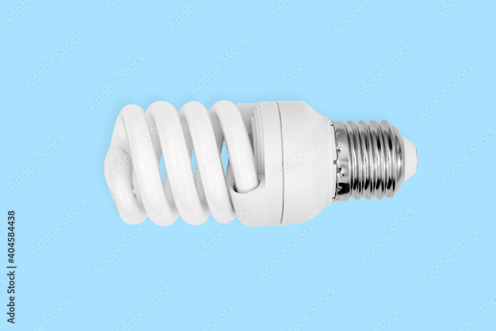 Electric light bulb of savings on a blue background. Electric light bulb of savings on a blue background.