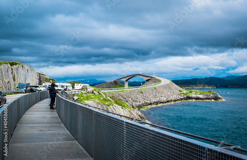 Fishermen on Hulvagen Bridge near Atlantic Ocean Road, passing through small islands in Norwegian Sea. Norway. photo