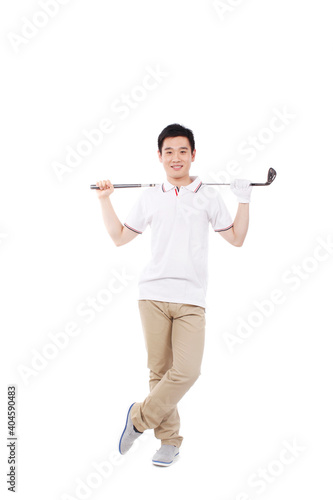 A happy young business man playing golf