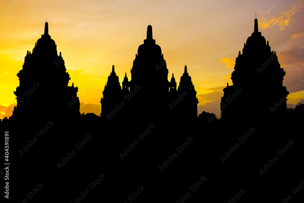 Silhouettes of Prambanan temple at sunset