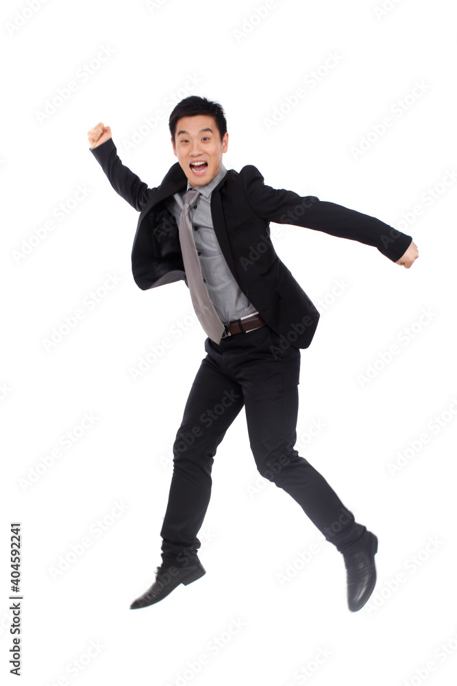 A happy young Business man Jumping up