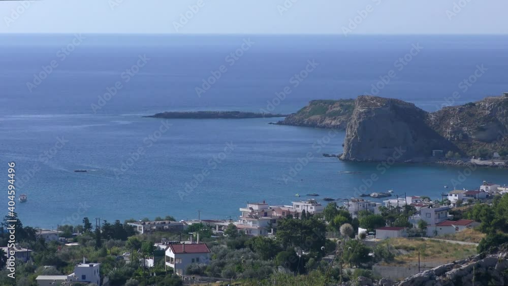 Mediterranean sea landscape, rocky cape and island from the height of the coastal ridge. Rhodes, Stegna. Mediterranean sea landscape, rocky cape and island from the height of the coastal ridge. Rhodes, Stegna.