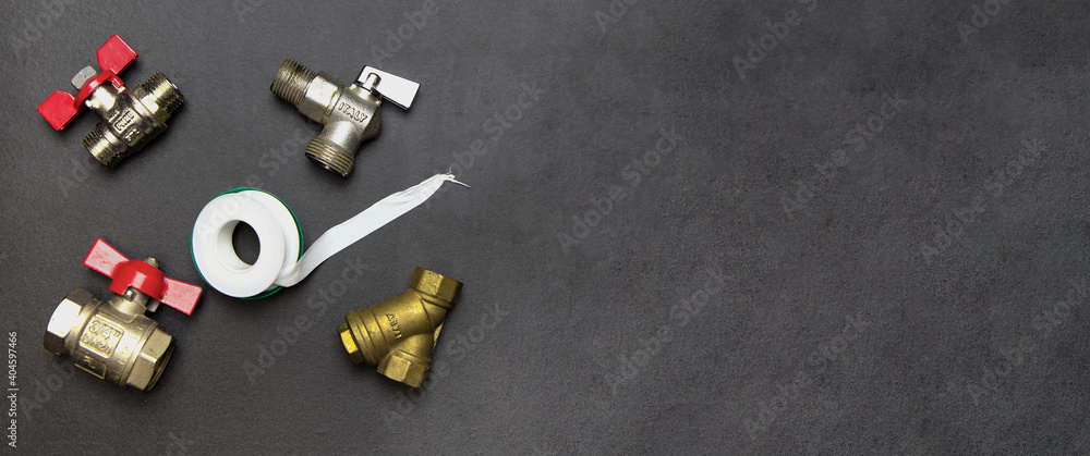 plumbing tools and equipment on black background plumbing tools and equipment on black background