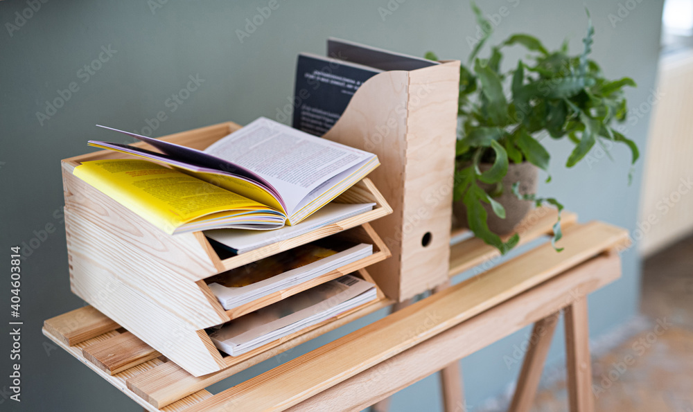 Φωτογραφία Paper and document wooden tray holders and organisers on desk, natural decor concept