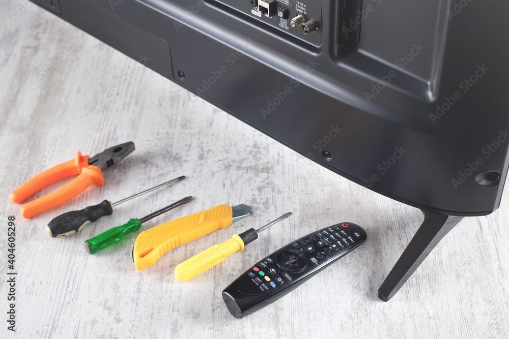 Fototapeta premium Tv and repairing tools on the table.
