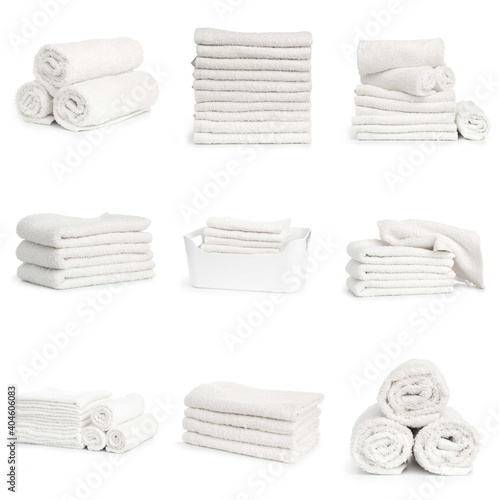 set of white spa Folded clean soft towels on white background
