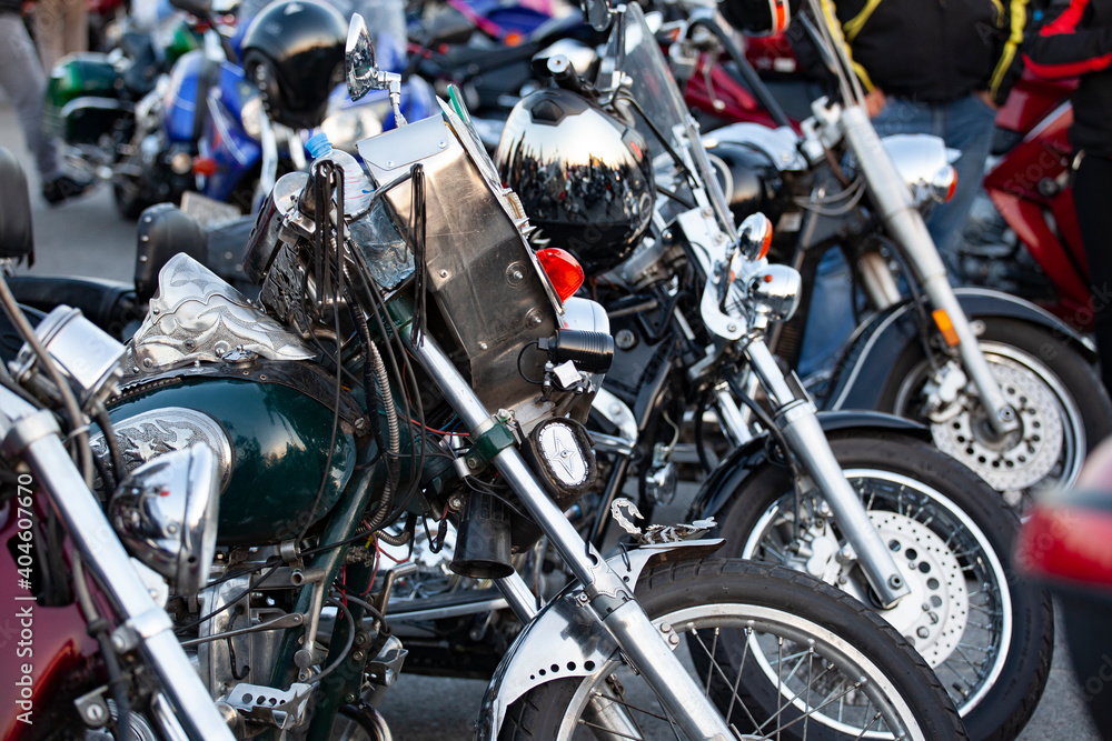 Classic Motorcycles group parking on street during journey. Classic Motorcycles group parking on street during journey.