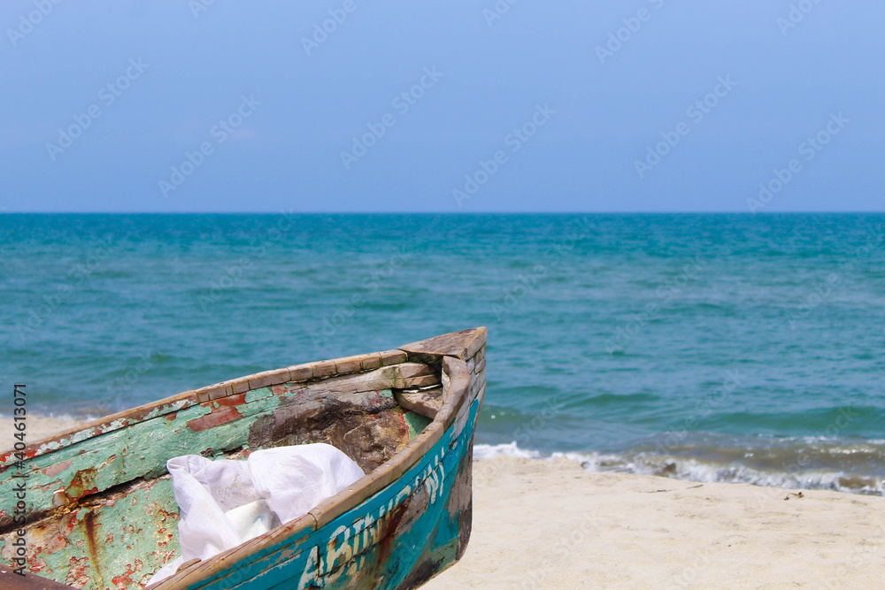 Old boat on Honduran beach Old boat on Honduran beach