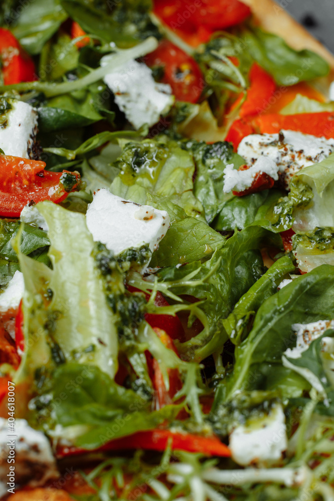 vegetarian pizza with cheese tomatoes and greens vegetarian pizza with cheese tomatoes and greens