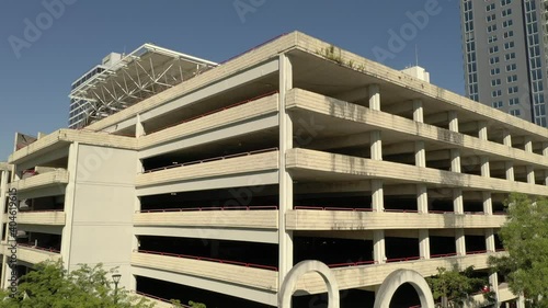 Downtown Fort Lauderdale Florida municipal parking garage aerial drone rise and tilt down reveal photo