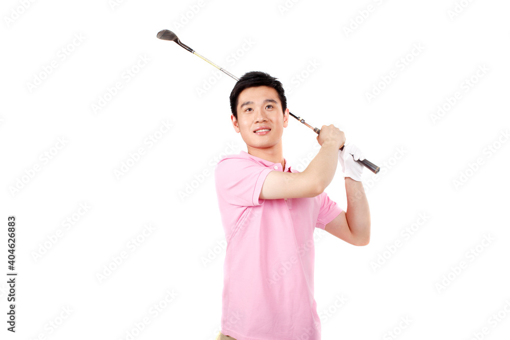 A happy young business man playing golf A happy young business man playing golf