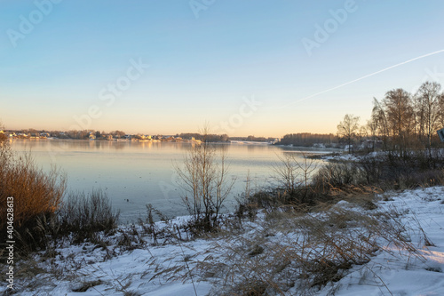 Ice on the Uvod reservoir on a sunny winter day  Ivanovo region.