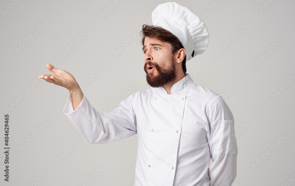 Male cook Professional restaurant working in the kitchen Male cook Professional restaurant working in the kitchen