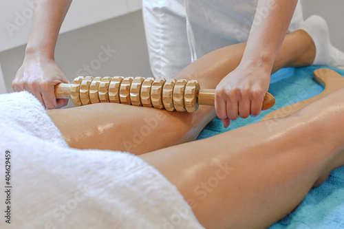 Maderotherapy wooden equipment for anti-cellulite massage photo