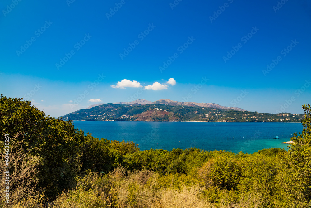 View from Albanian coast to Corfu island, Greece. Beautiful Ionian sea landscape.