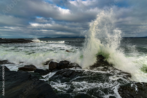The Atlantic ocean waves crashing in to the cliffs off the west coast of Ireland, County Donegal, Creavy pier