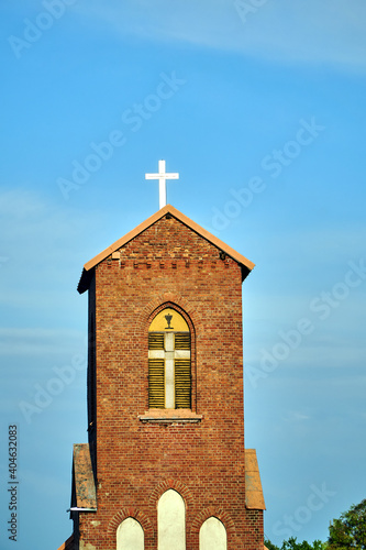 Foto Medieval brick belfry of Roman Catholic church in Gothic style