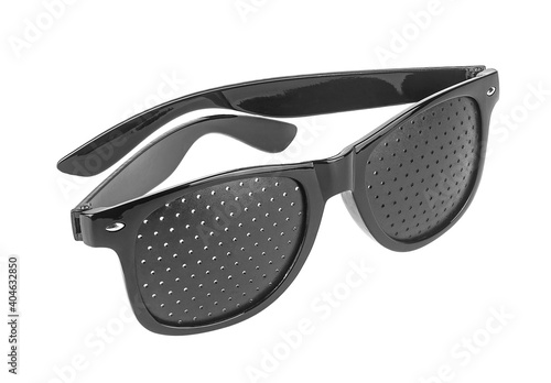 Perforated glasses isolated on a white background. Special glasses with holes for vision, pinhole glasses.