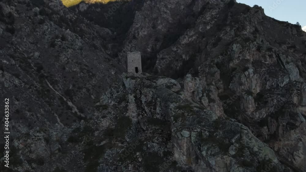 Ruins of a fortress high in the mountains from a bird's eye view. Ruins of a fortress high in the mountains from a bird's eye view.