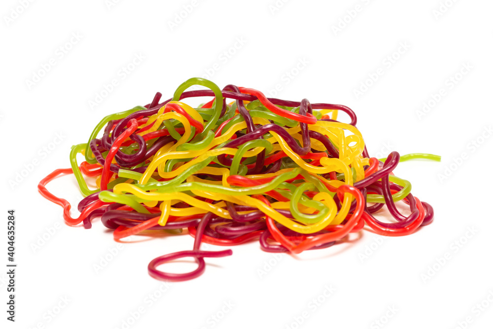 Tasty jelly spaghetti isolated on white background. Candy stripes. Tasty jelly spaghetti isolated on white background. Candy stripes.