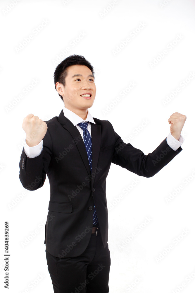 Young Business man laughing with fists up Young Business man laughing with fists up