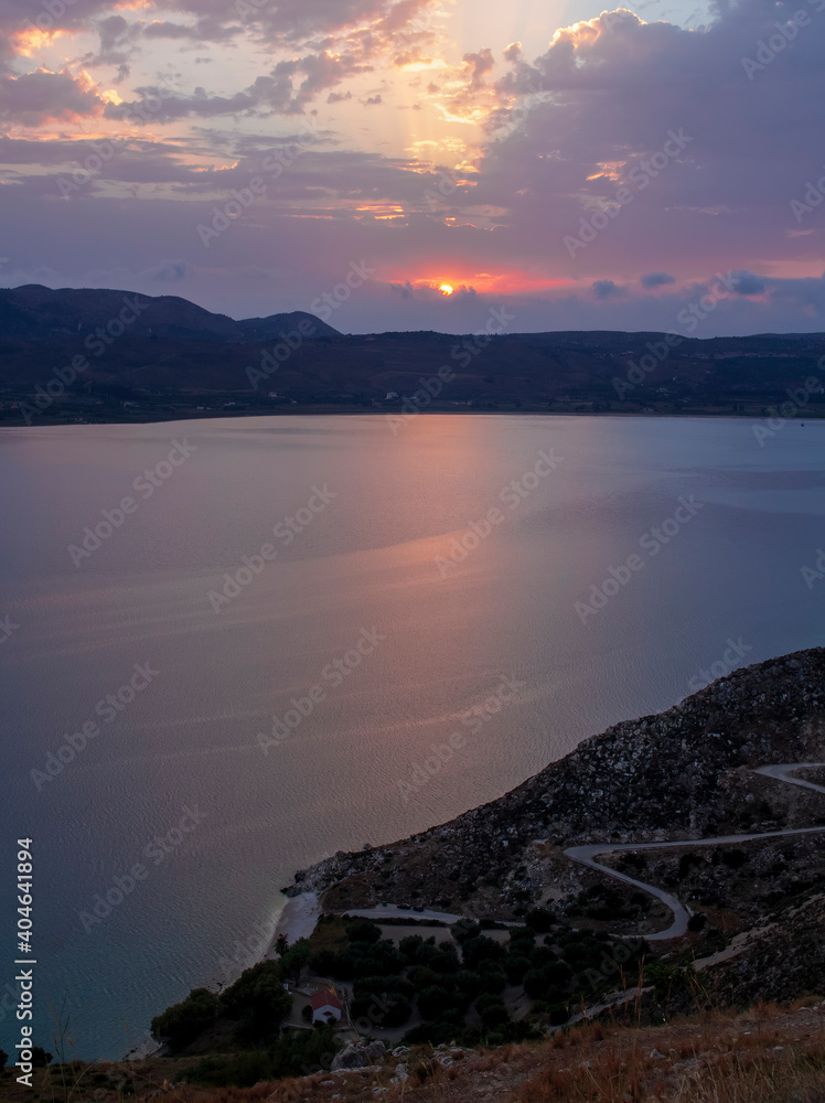 Portrait view of sunset over a bay in Kefalonia