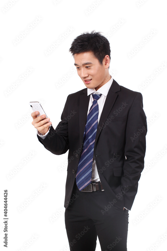 Portrait of a businessman standing with cellular phono Portrait of a businessman standing with cellular phono