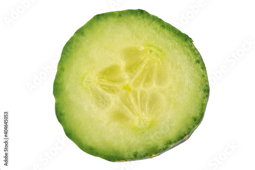 macro image of a single slice of cucumber