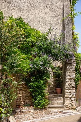 Exterior view of a stone entranceway to a quaint cottage in Provence  south of France
