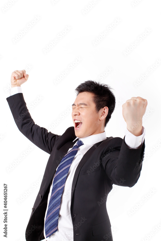 Businessman excited about his success in front of white background Businessman excited about his success in front of white background