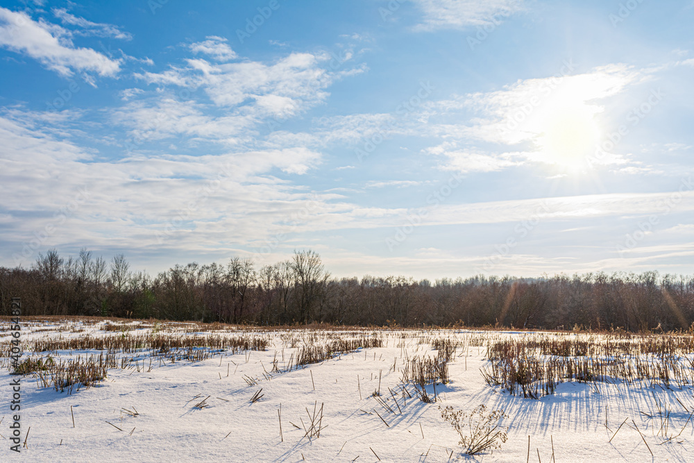 Empty Countryside Landscape in Sunny Winter Day with Snow Covering the Ground, Abstract Background