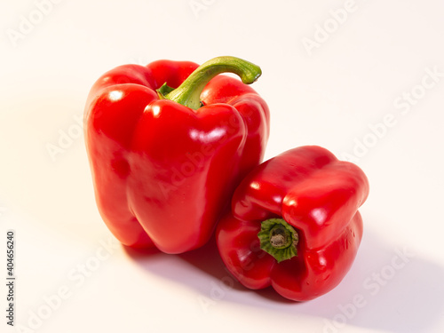 Two sweet red pepper isolated with white background