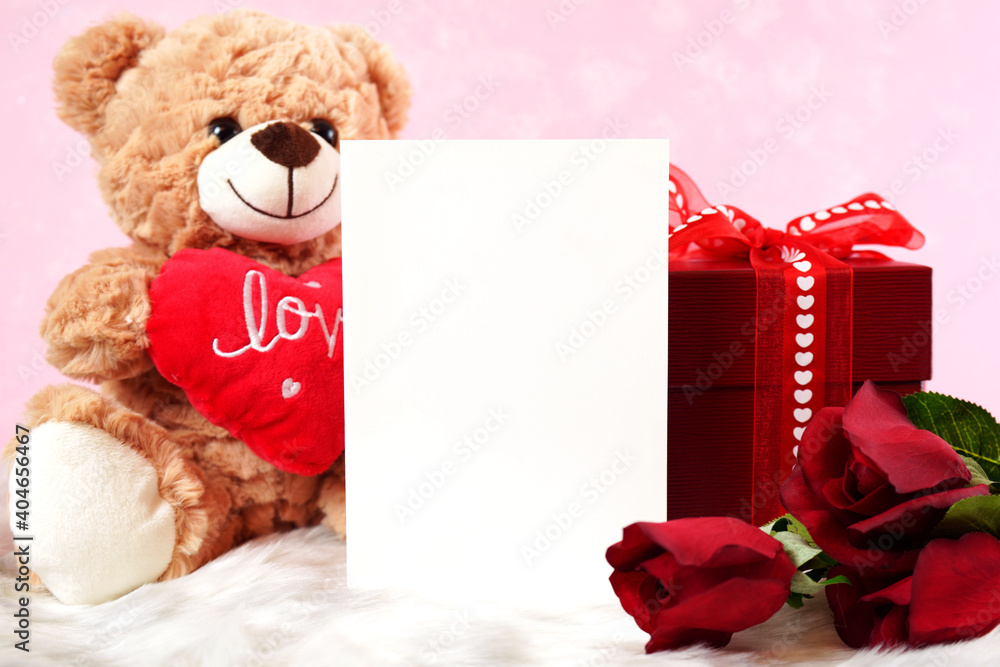 Φωτογραφία Happy Valentine's Day Bears With Greeting Card, red roses and gift against pink and white fur background