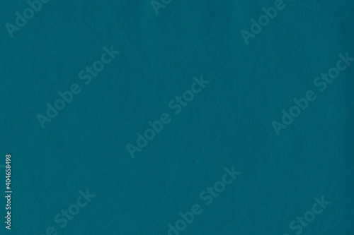 Clean blue retro paper background. Vintage cardboard texture. Grunge paper for drawing. Simple blank fabric pattern.