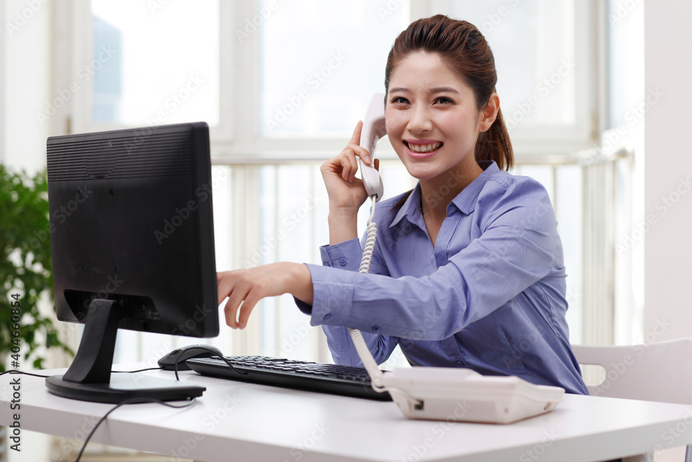A young Business woman using a smartphone A young Business woman using a smartphone