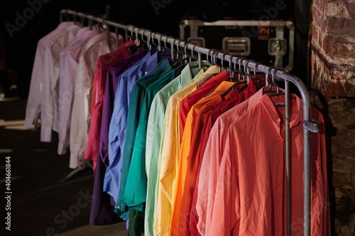 wardrobe with colorful long-sleeved shirts
