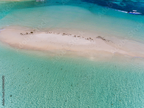 A small sand spit near Ile Moyenne island in Sainte Anne Marine National Park in Seychelles photo