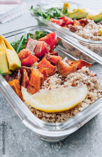 Vegetarian healthy meal prep containers . Raw vegetables and quinoa for lunch on light table. Vegan  healthy  detox food concept. Selective focus