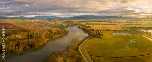 Washington State's Great Skagit Valley. The Skagit River runs from high in the Cascade Mountains to Puget Sound. The Skagit floodplain is one of the richest agricultural areas in the world.  photo