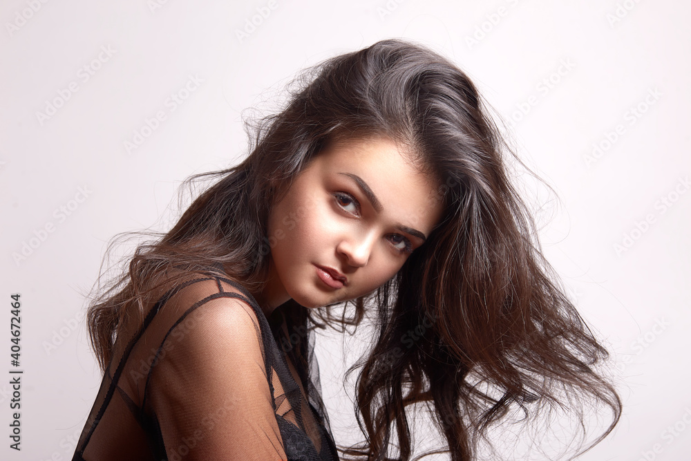 Portrait of sexy woman with beautiful make-up and long curly hair Portrait of sexy woman with beautiful make-up and long curly hair
