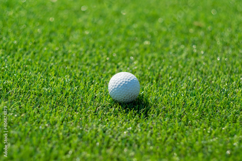 Golf balls on artificial grass with blur background 