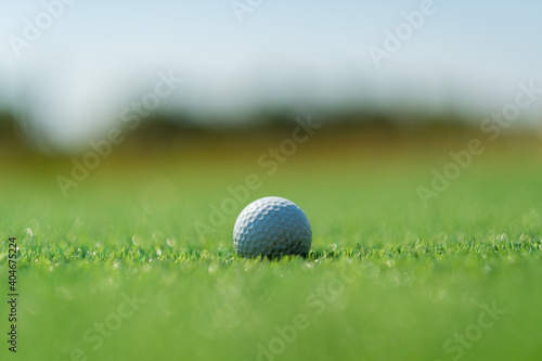 Golf balls on artificial grass with blur background
