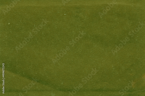 Vintage and old looking paper background. Retro cardboard texture. Grunge paper for drawing. Ancient book page.