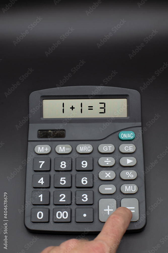 Calculator on office desk with incorrect calculation on black background, finger is pushing calculate button Calculator on office desk with incorrect calculation on black background, finger is pushing calculate button